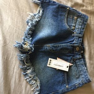 Distressed denim shorts